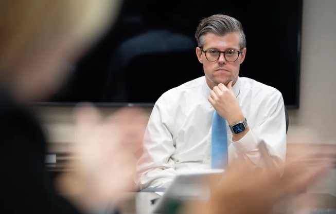 Kody Kinsley listens during a meeting. (Julia Wall for The Assembly)