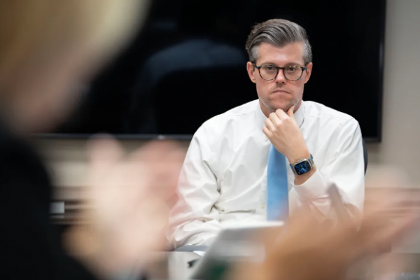 Kody Kinsley listens during a meeting. (Julia Wall for The Assembly)